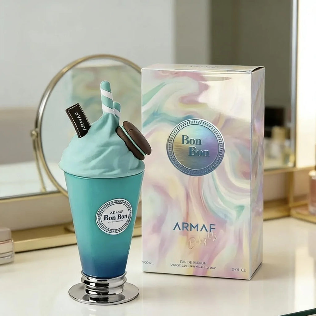 Blue and green perfume bottle with 'Armaf' packaging on a reflective surface.