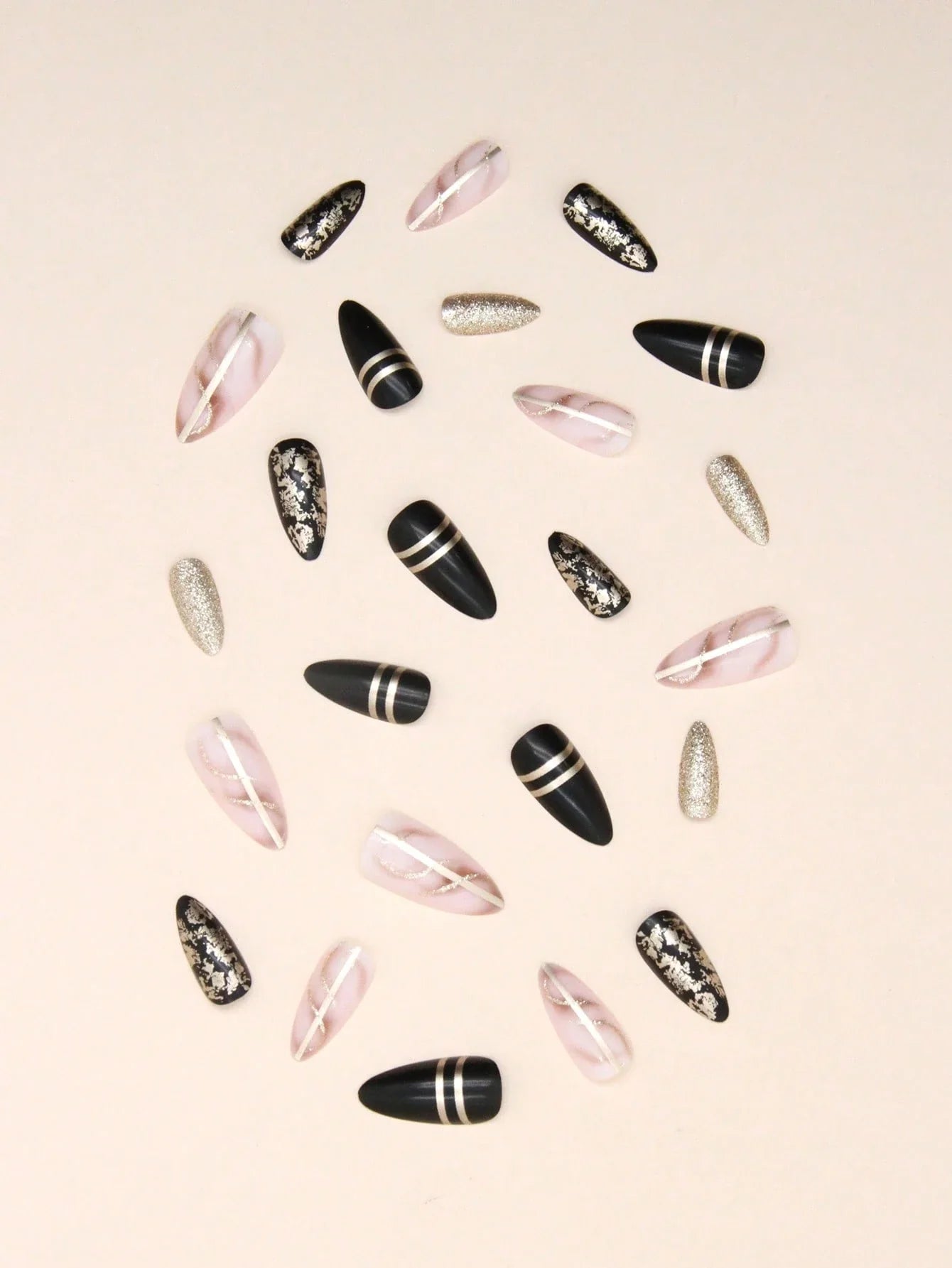 Set of black, pink, and gold nail art designs on a beige background
