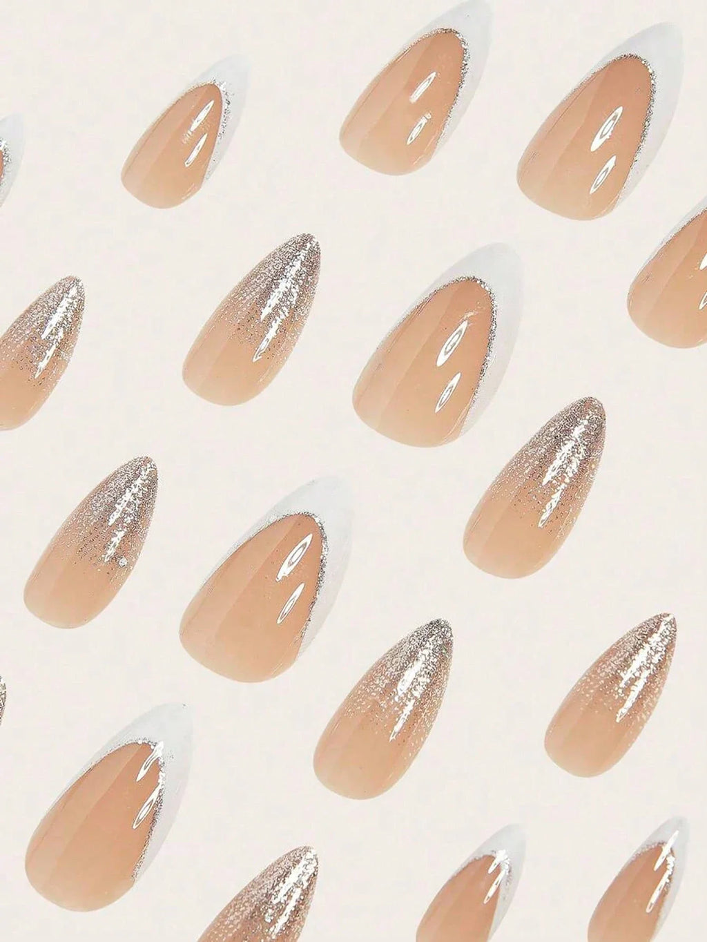 Nail art design with nude and silver gradient nails on a light background