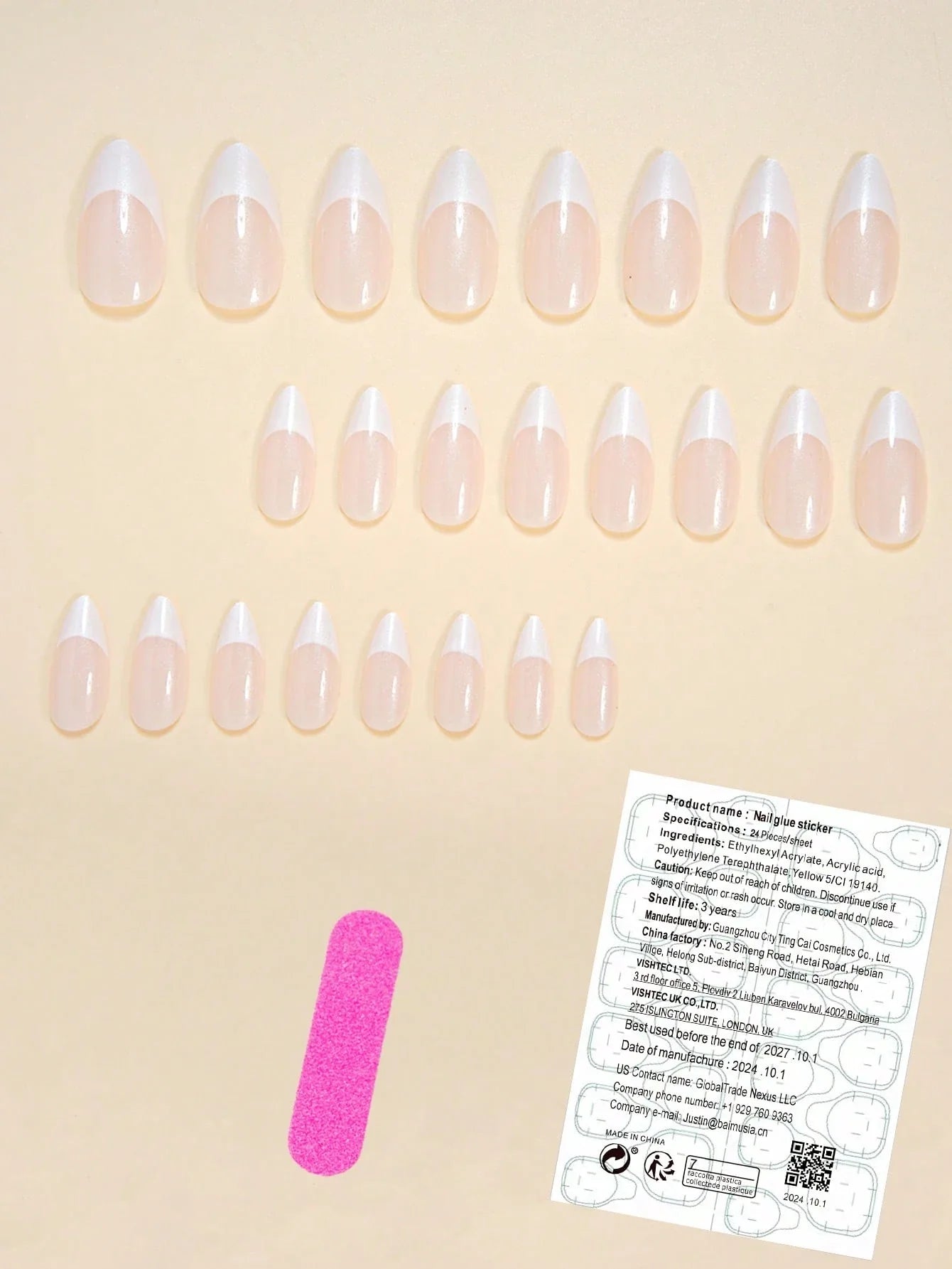 Set of false nails with a pink bandage and label on a beige background